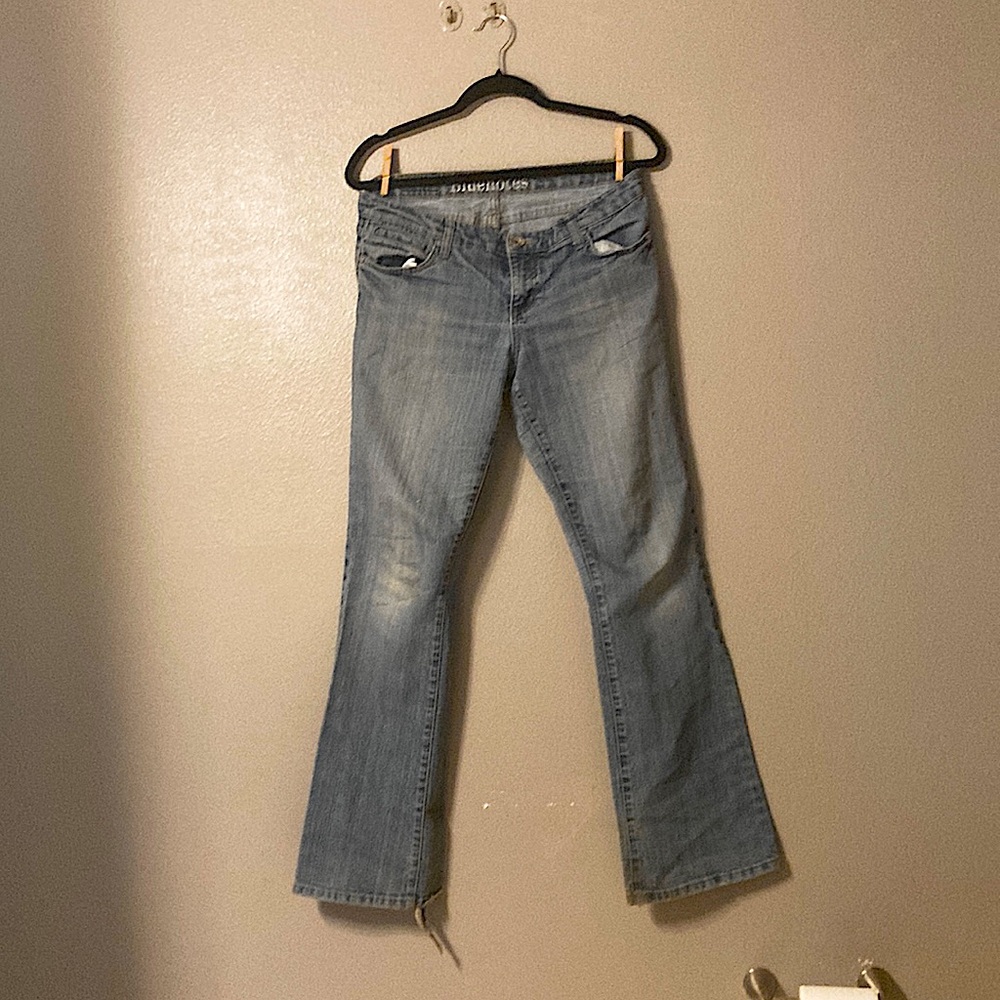 Medium Wash denim flared Jeans.